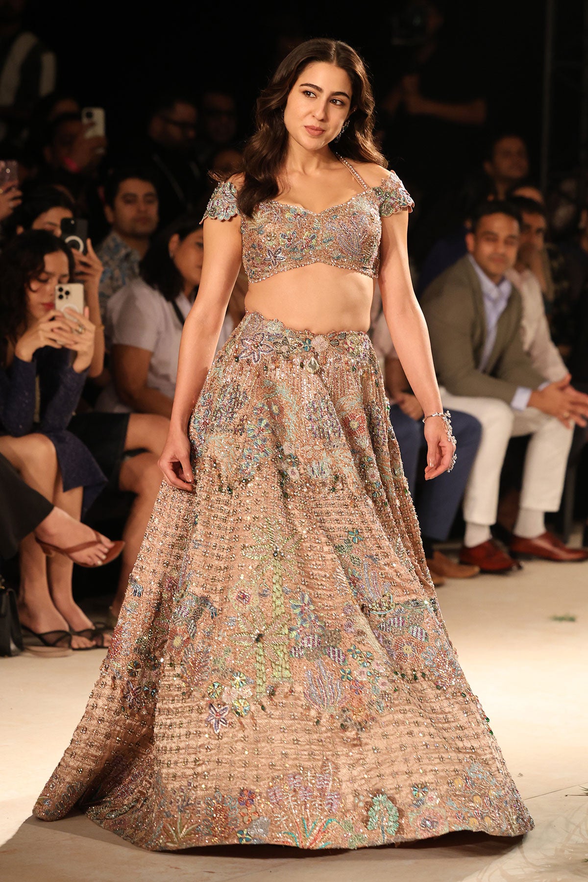 Hemline detail showcasing brocade finish and applique edging.