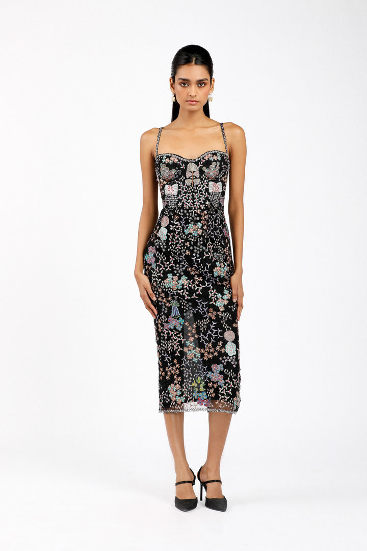Woman wearing Matilda black tulle net bodycon dress