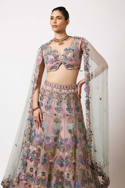 Woman in pink lehenga with HK finish left view