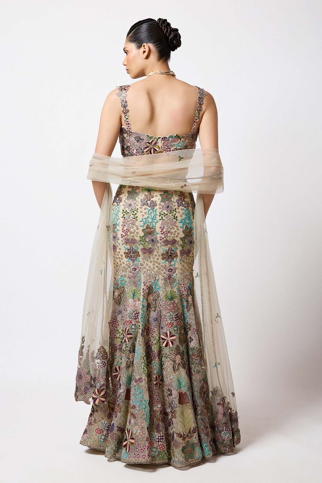 Applique embroidery and neckline close-up beige outfit