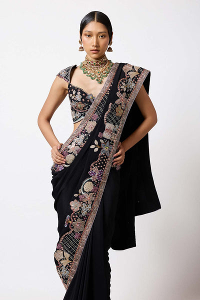 Woman in black broad mulberry crepe set side profile