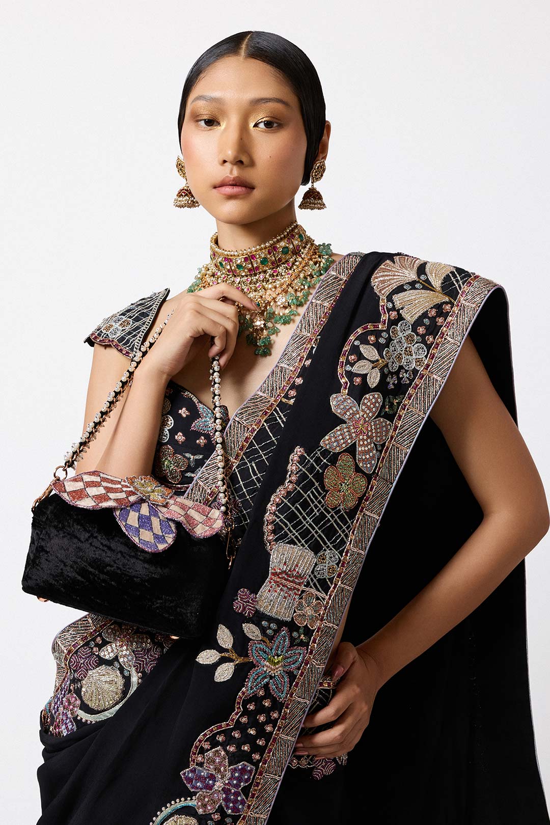 Close-up of black crepe applique and embroidery front