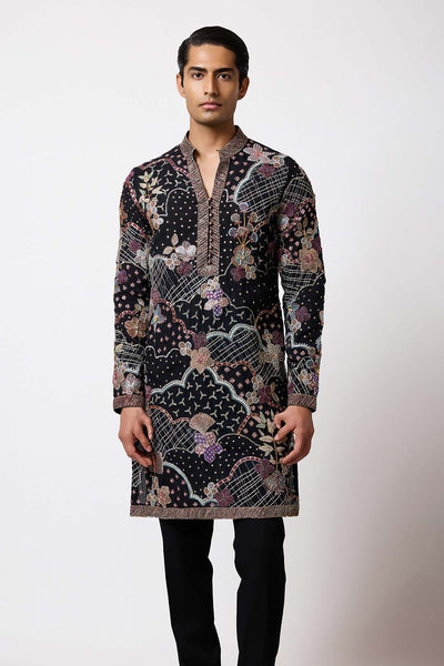 Close-up of black kurta neckline and applique detailing