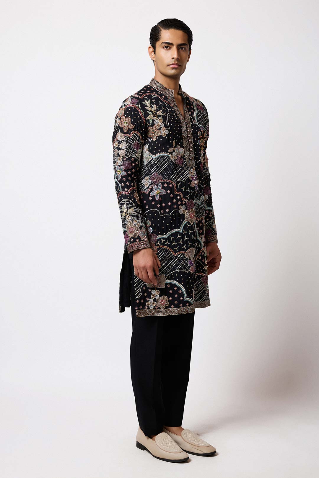 Left side view of black organza kurta by Aisha Rao