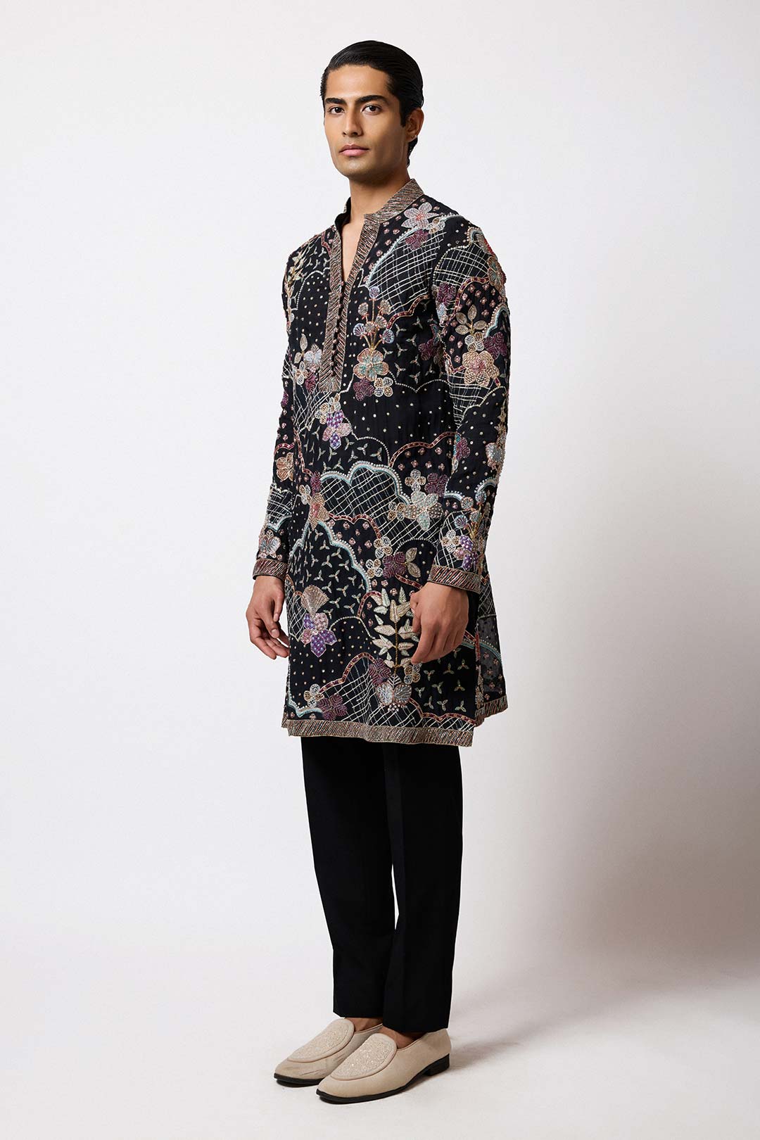 Right side view of Aisha Rao black embellished kurta