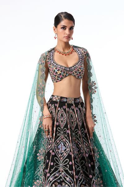 Full look of the Wild At Heart black-teal tulle lehenga with coordinated blouse and dupatta.