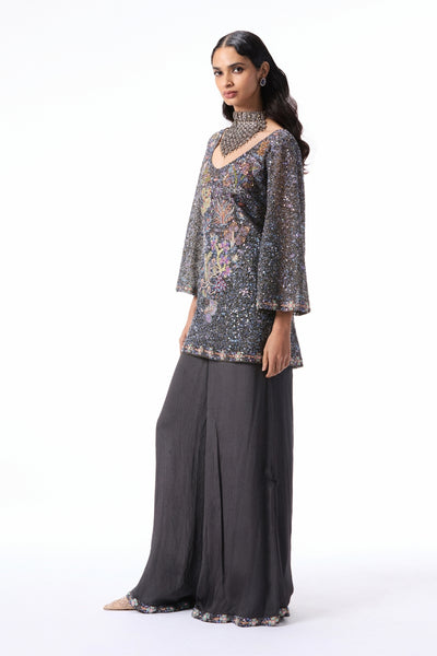 “Designer gunmetal sharara featuring applique embellished tulle kurta and chiffon pants.”