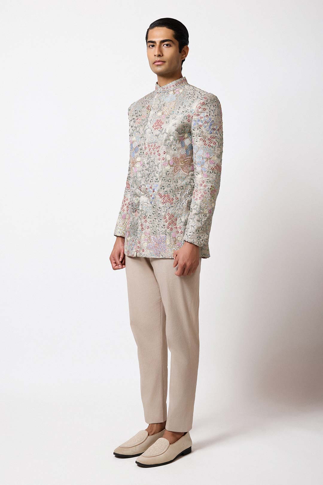 Woman wearing Aisha Rao blue pearl tissue lehenga front view