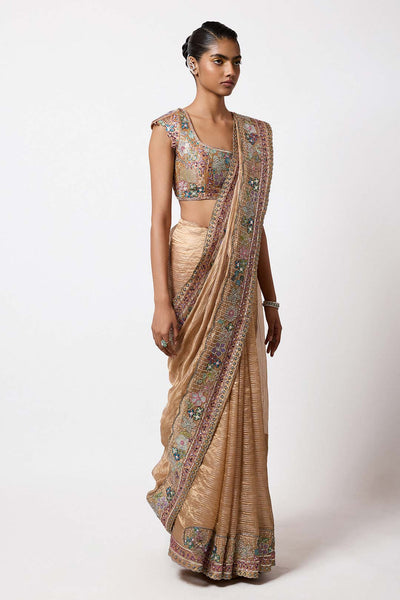 Woman wearing Aisha Rao satin brass Banarasi tissue front