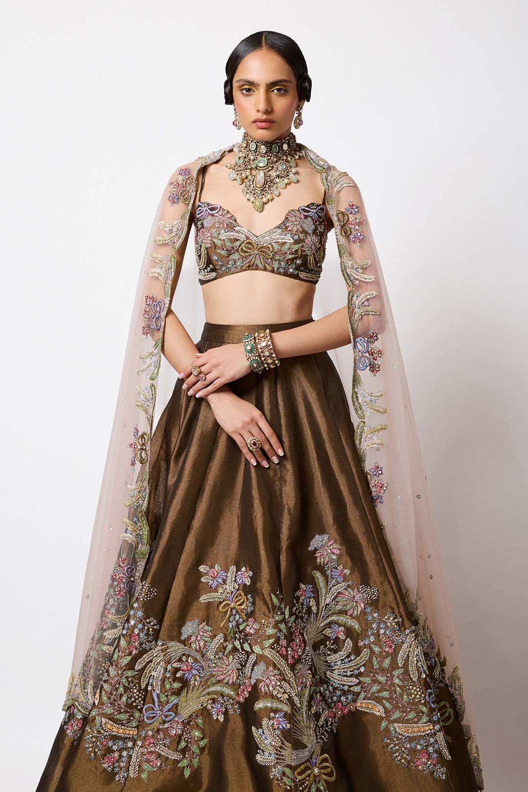 Front embroidery detail of metallic copper lehenga