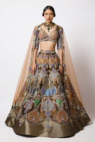 Woman wearing Aisha Rao copper metallic tissue lehenga