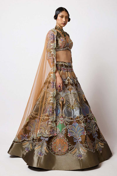 Woman wearing Aisha Rao copper tissue block lehenga front view