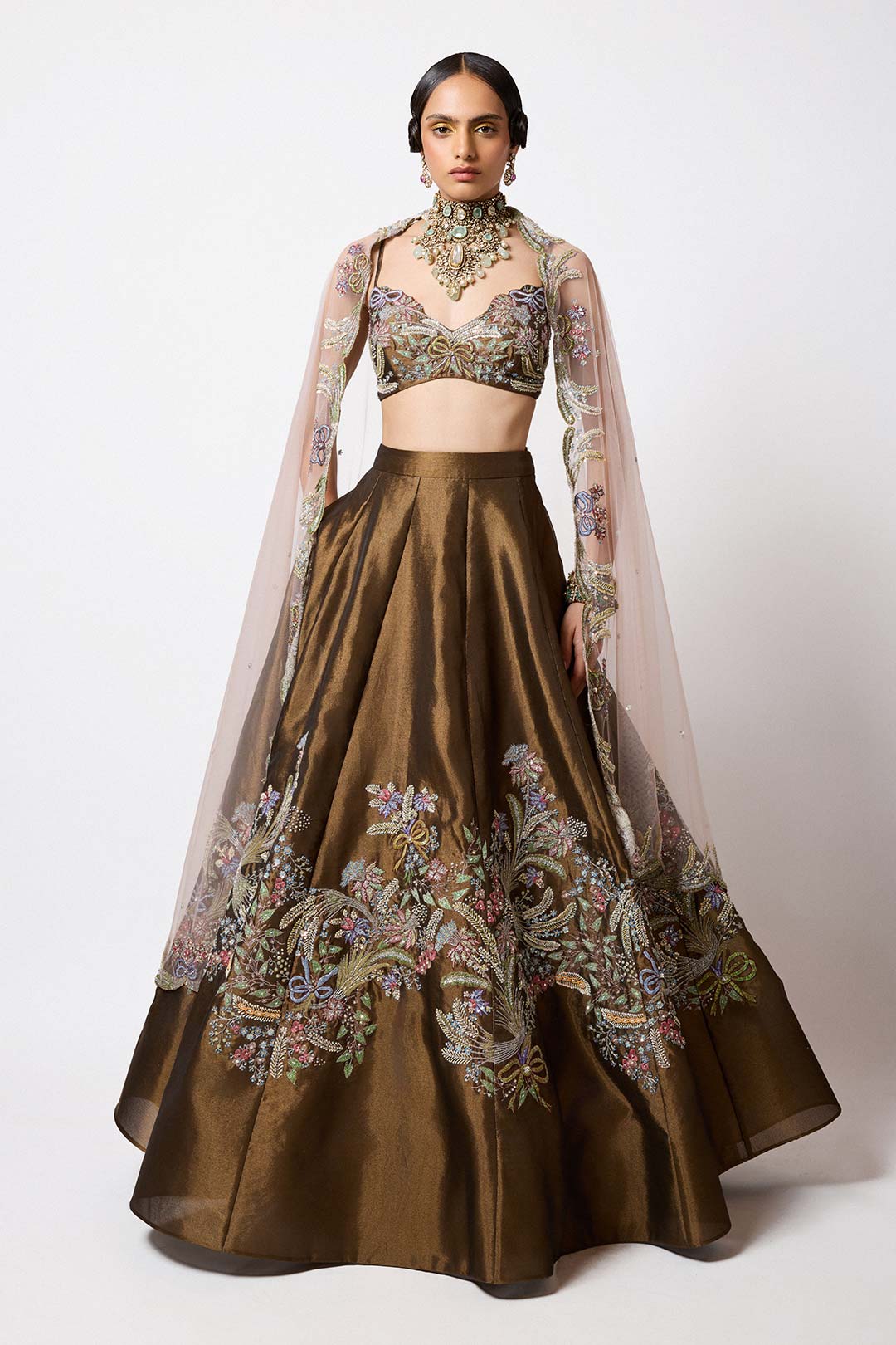 Woman wearing Aisha Rao Copper Metallic Applique Embellished Tissue Mk Lehenga With