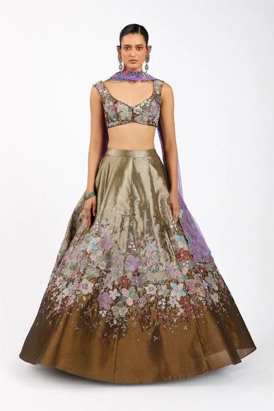 Woman wearing Matilda copper MK lehenga with blouse and dupatta