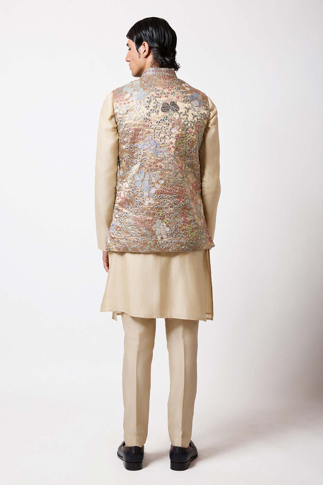 Close-up of back applique motif and brocade fabric detail