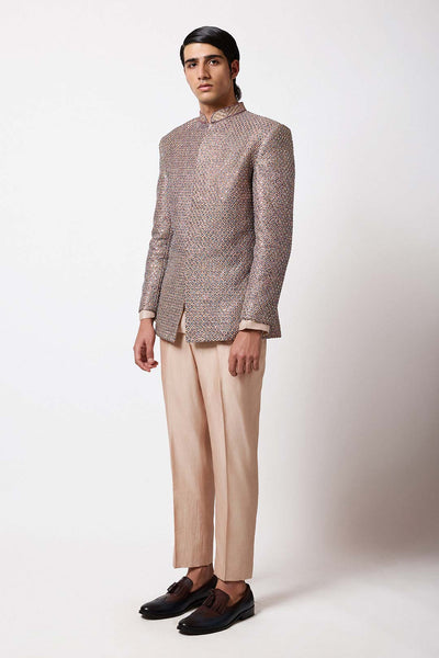 Woman wearing Aisha Rao desert gold bandhgala front view