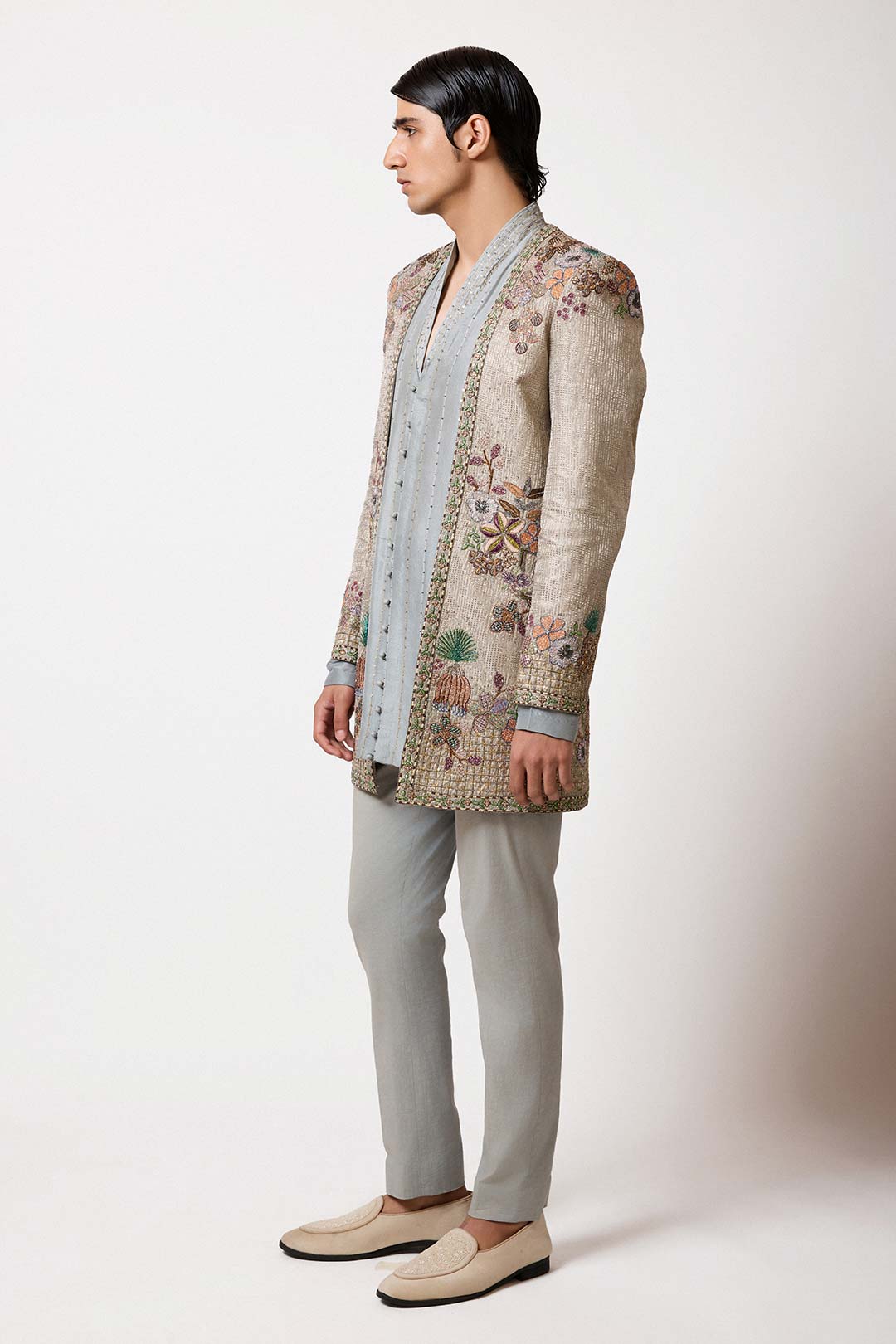 Grey-blue Banarasi lehenga side view with dupatta