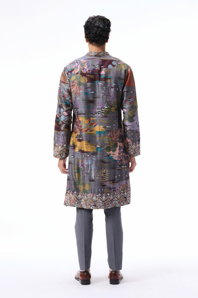 Back profile of the gunmetal printed raw silk kurta styled with twill poplin pants.