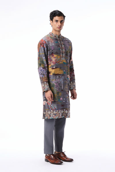 Side angle view of the gunmetal printed raw silk kurta featuring applique embellishment.