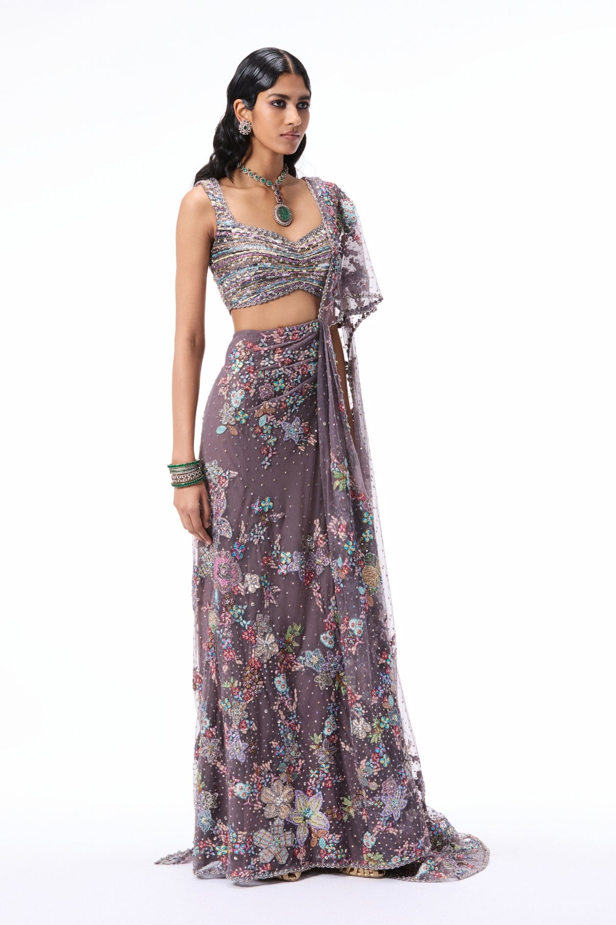 “Gunmetal tulle drape saree showcasing heavy draping and an embellished tulle blouse.”