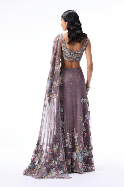“Gunmetal heavy draped tulle saree paired with a delicate tulle blouse from Wild At Heart.”