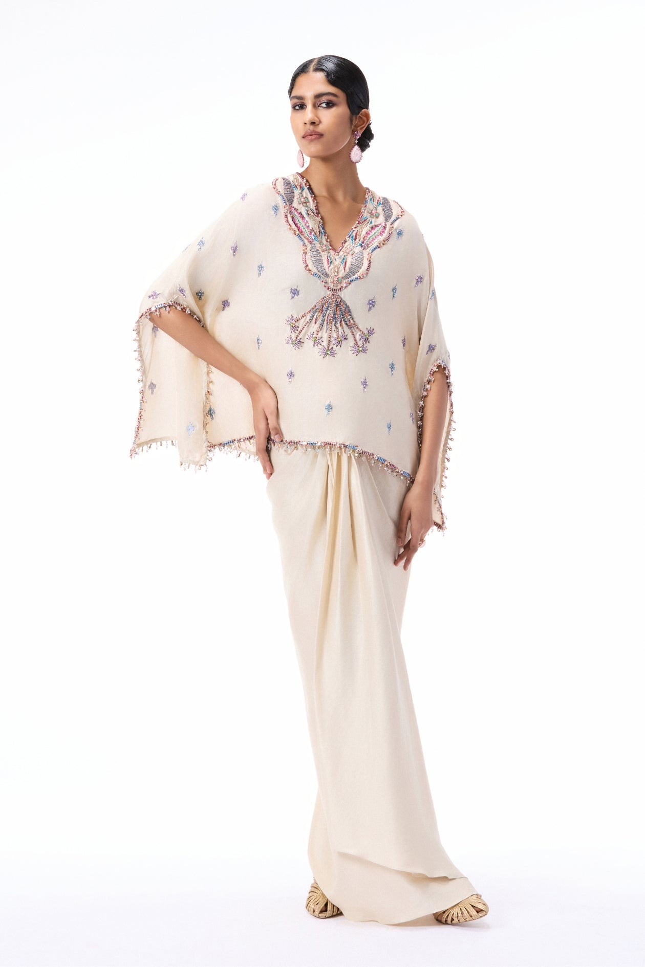 Full look of the Wild At Heart ivory dupion silk set featuring a short embellished kurta and draped skirt.