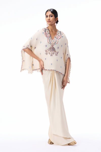 Full look of the Wild At Heart ivory dupion silk set featuring a short embellished kurta and draped skirt.