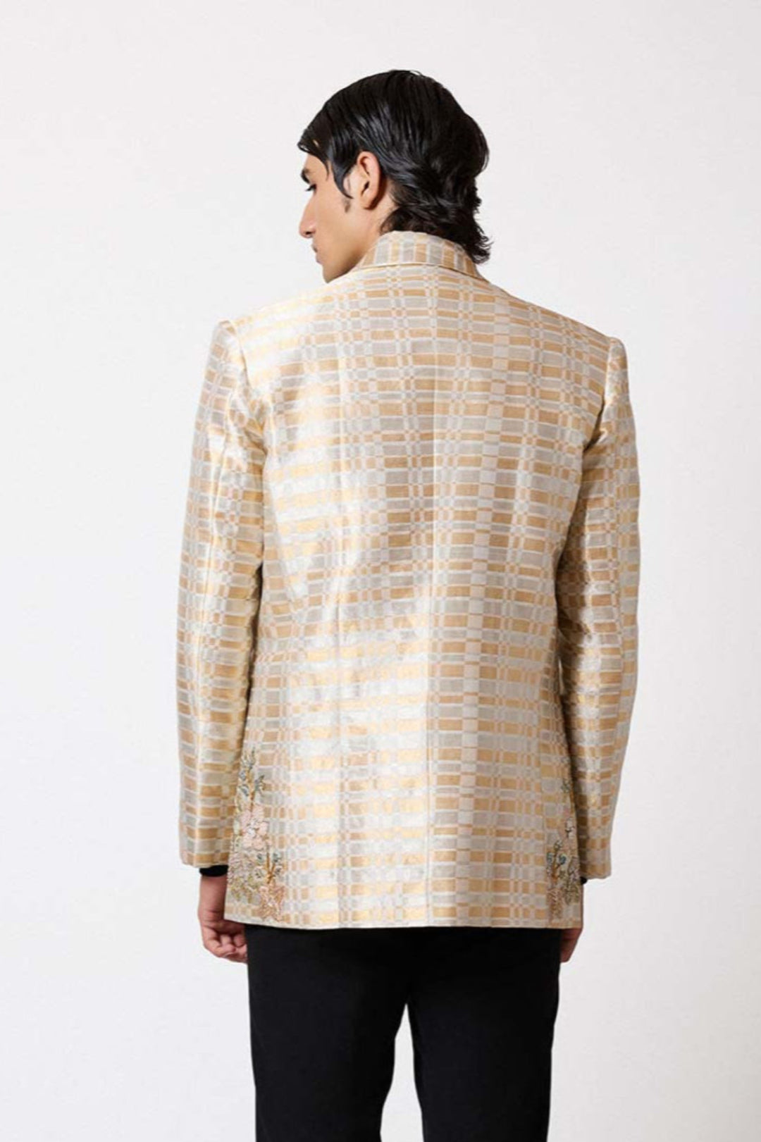 Gold embellished lehenga and blouse right angle view