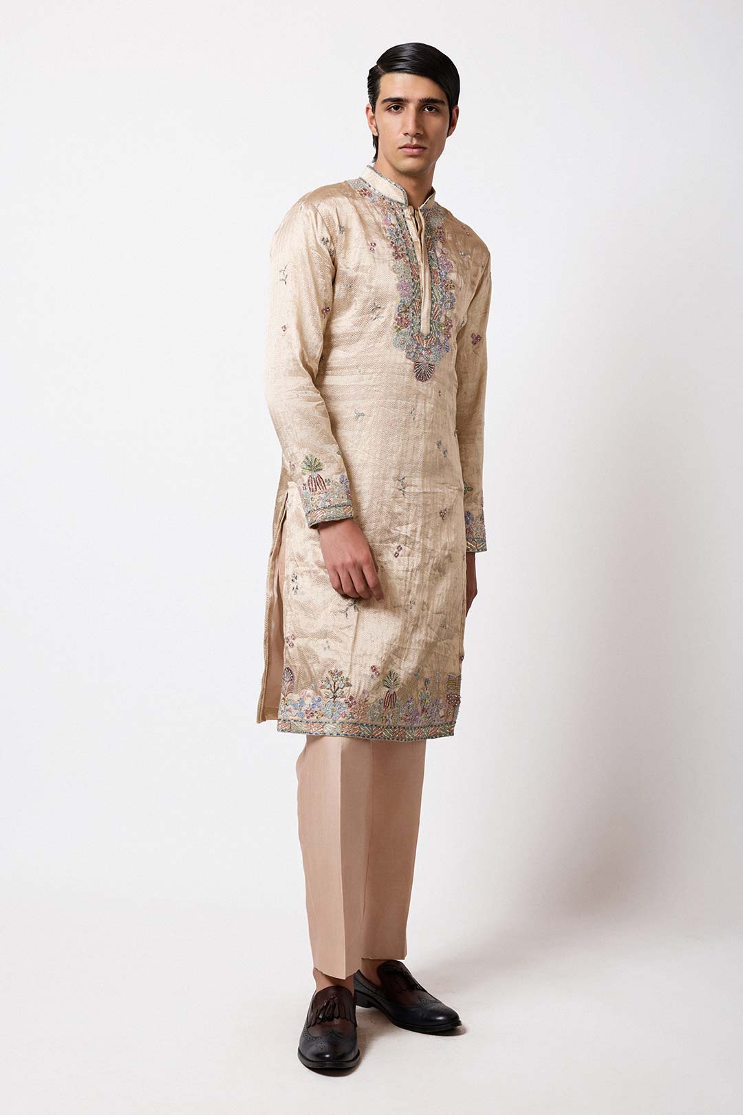 Man wearing Aisha Rao ivory gold brocade kurta front view