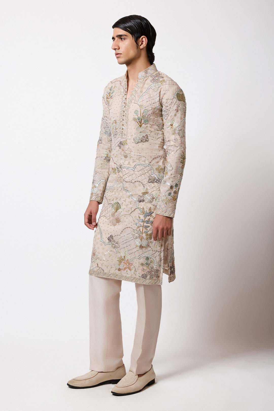 Right side view of Aisha Rao ivory applique kurta for men