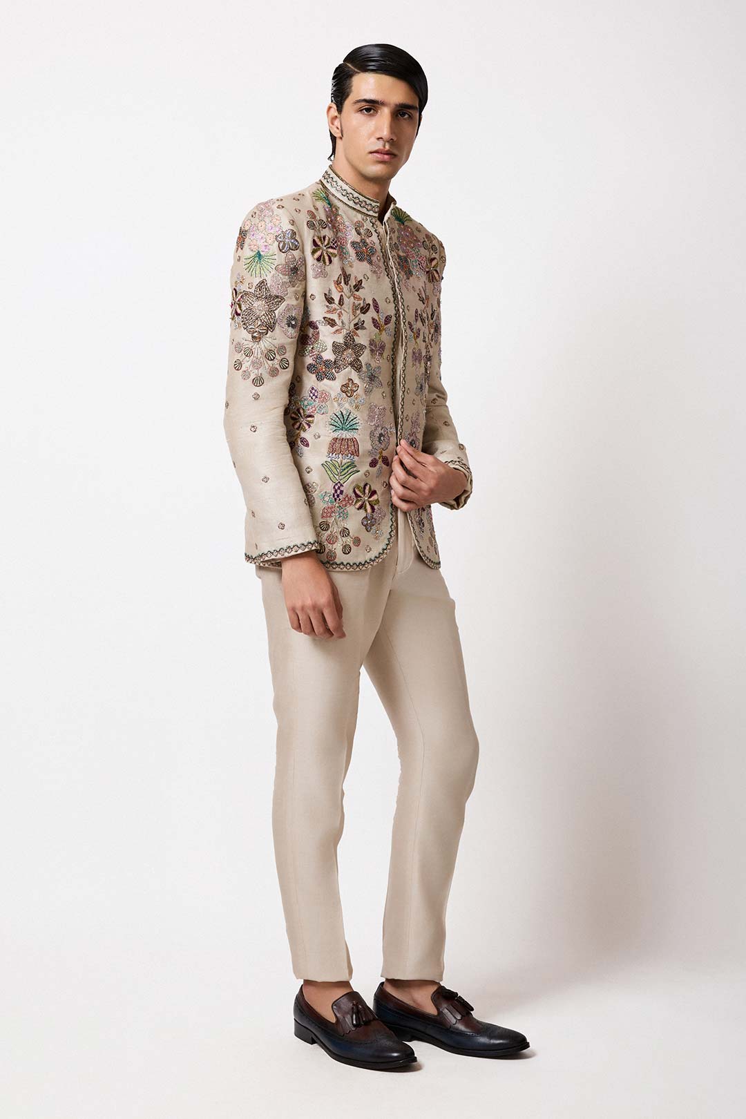 Left side view of pastel ivory bandhgala by Aisha Rao