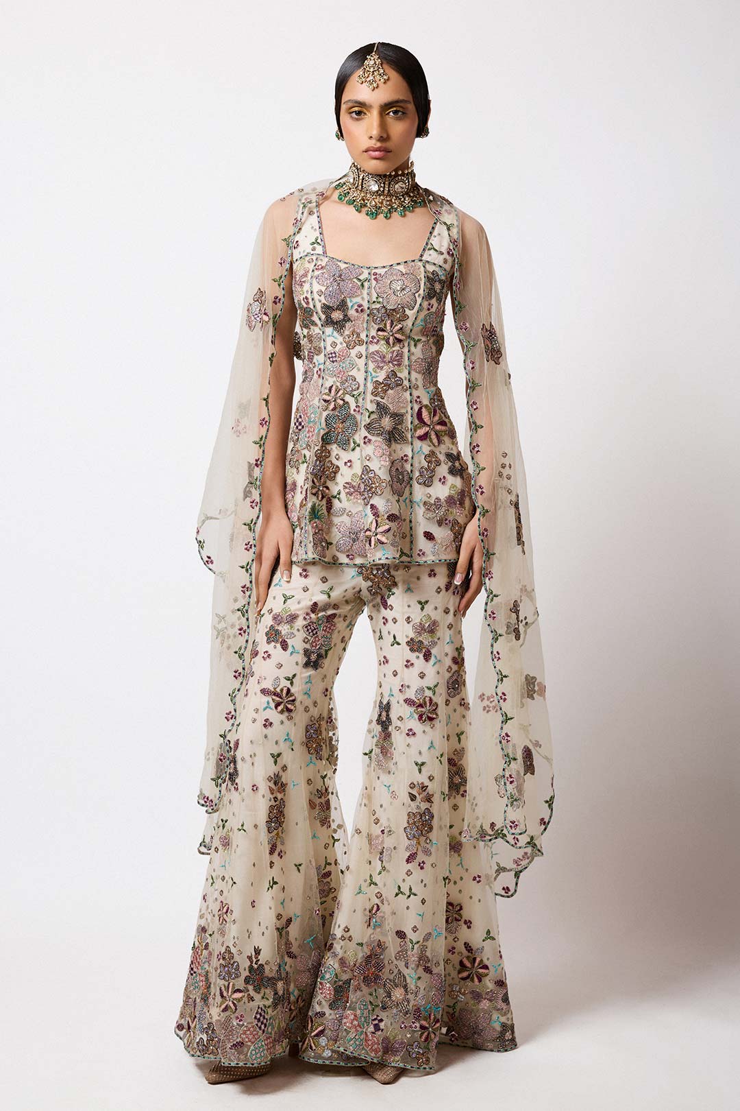 Woman wearing Aisha Rao Matilda Light Ivory Applique Embellished Net Short Panelled