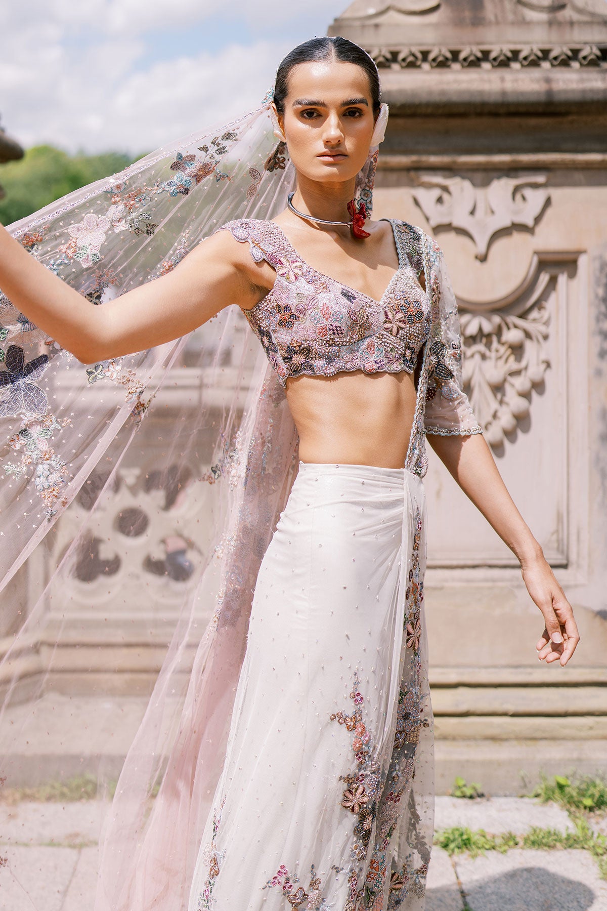 Aisha Rao ivory to pink lehenga, right profile view