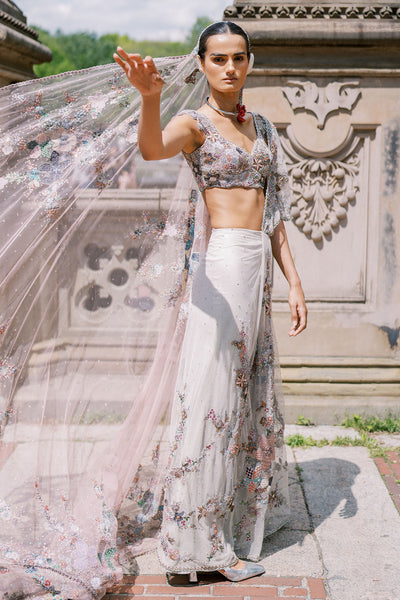 Close-up of embroidery on left side of Aisha Rao lehenga