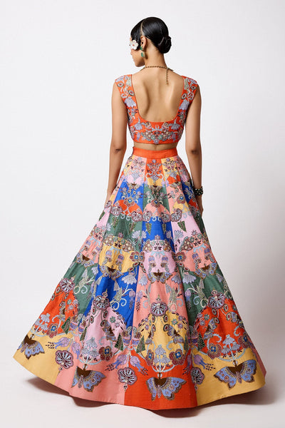 Woman in multicolour embellished lehenga left view