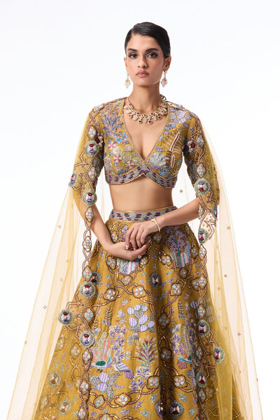Closeup of the blouse paired with the Wild At Heart mustard raw silk lehenga.
