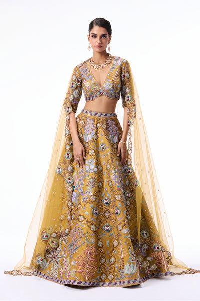 Full look of the Wild At Heart mustard raw silk lehenga paired with a coordinating blouse.