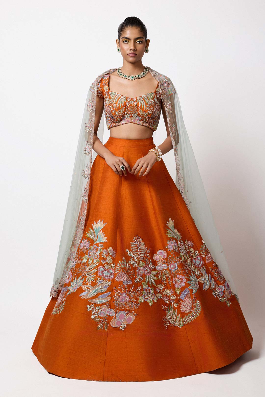 Woman wearing Aisha Rao Orange Applique Embellished Raw Silk Mk Lehenga With Blouse