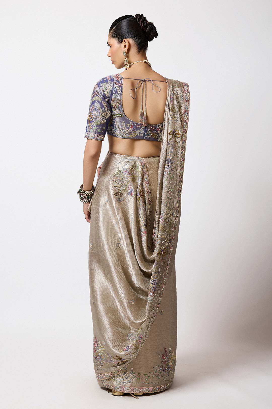 Pewter metallic embroidery and brocade detail close-up