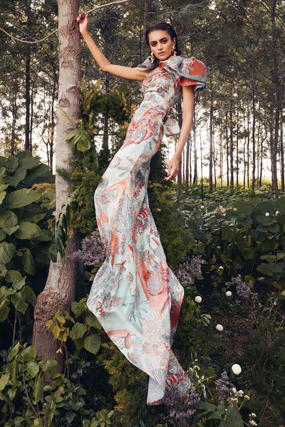 Left profile of Aisha Rao embellished Pastiche organza gown