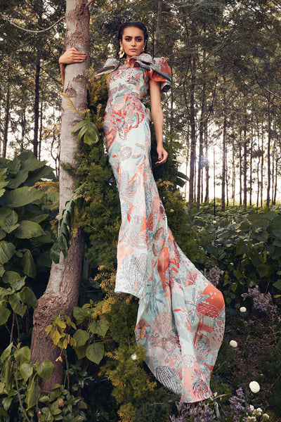 Aisha Rao gown with long trail and sleeve design left view