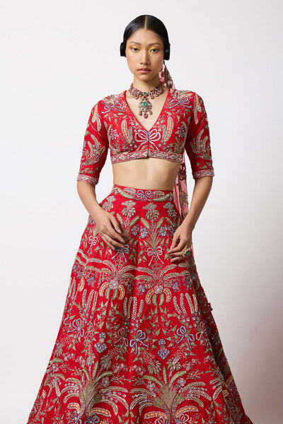 Blouse embroidery and bow close-up Aisha Rao red lehenga