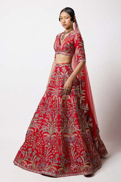 Right side view of Aisha Rao red lehenga with bow accent