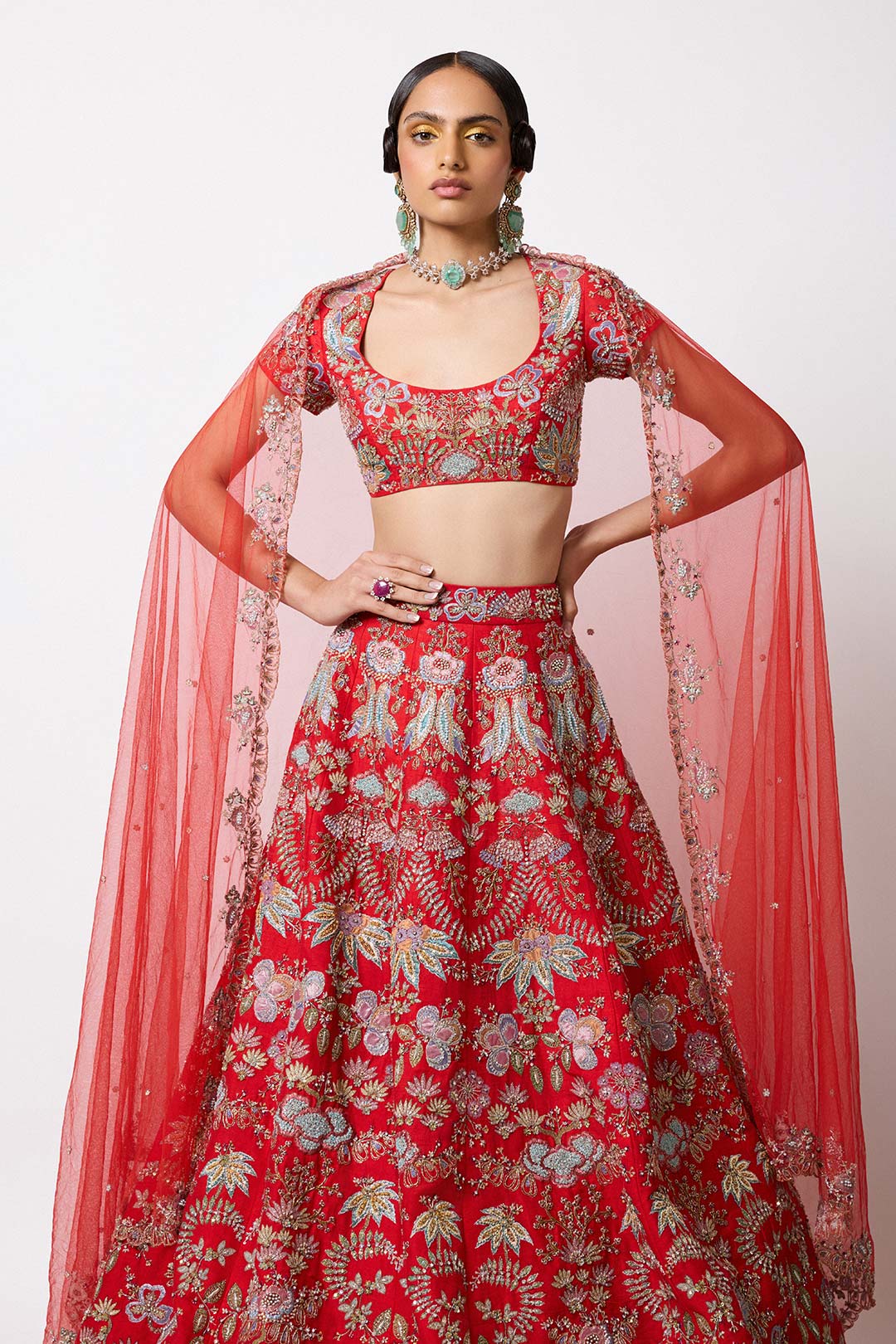 Model in red HK lehenga with embroidery full front angle