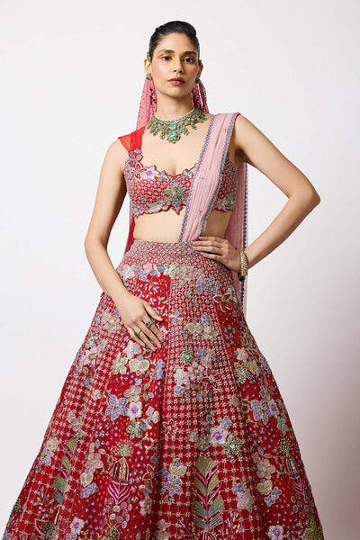 Red tulle lehenga blouse with embellished detail close-up