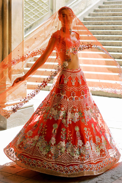 Rear view of Aisha Rao bridal red raw silk lehenga