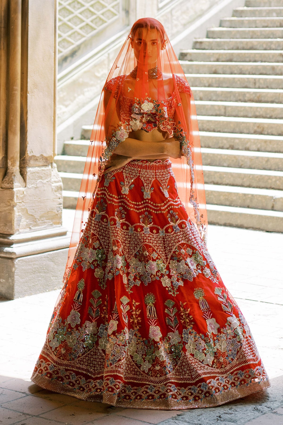 Close-up of bow and embroidery at lehenga back waist