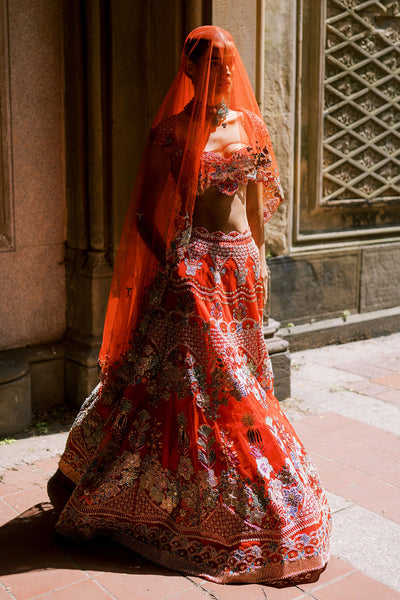 Close-up of dupatta drape on Aisha Rao lehenga