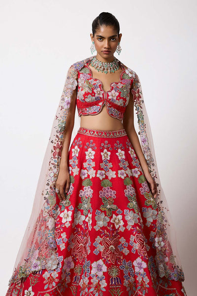 Woman in red HK lehenga with applique right profile