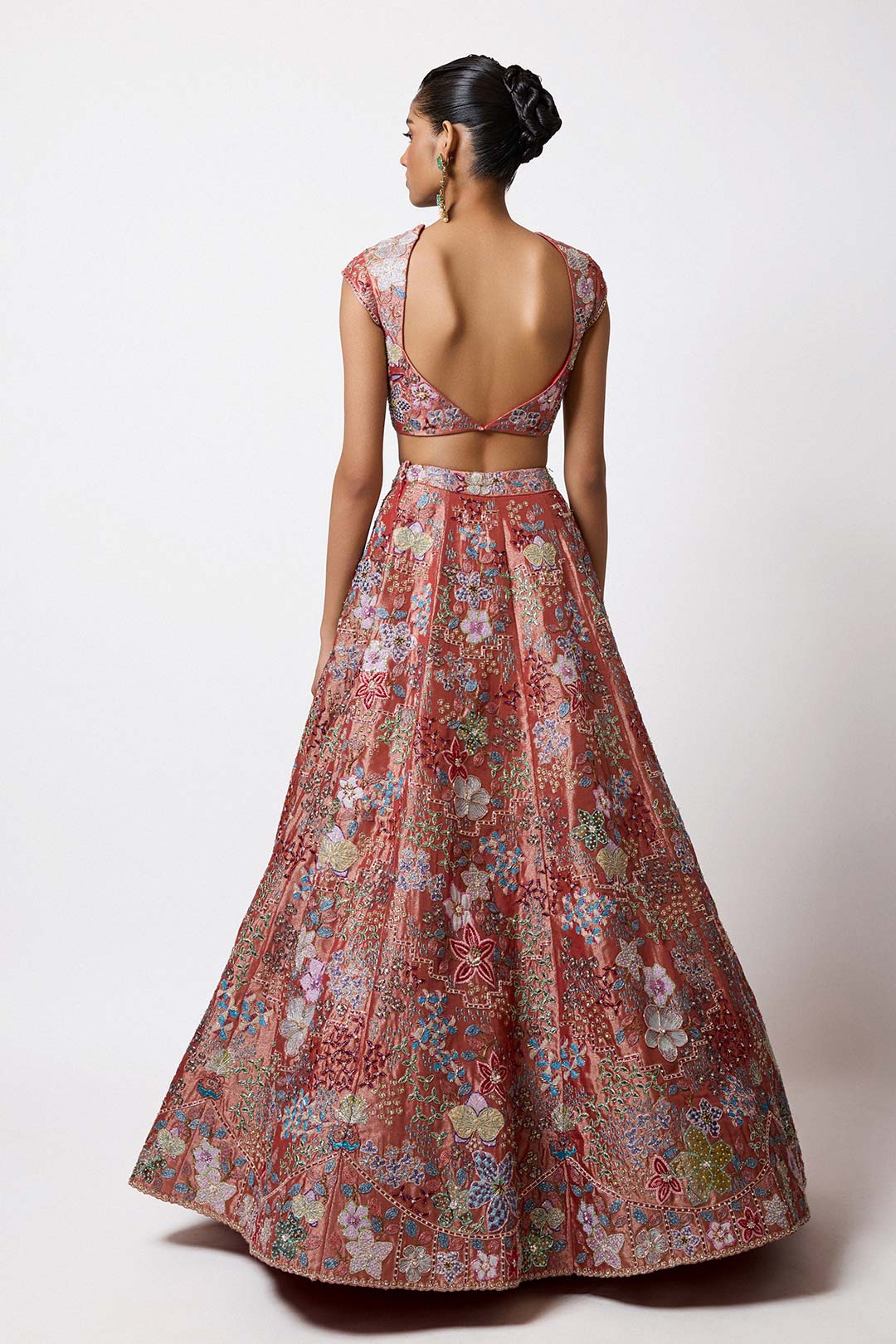 HK border and embroidery detail close-up rust outfit